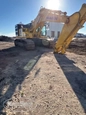 Back of used Excavator,Used Komatsu,Side of used Komatsu Excavator,Used Komatsu under sun,Side of used Excavator